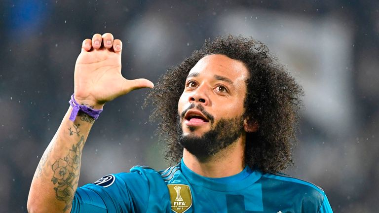 Real Madrid's Brazilian defender Marcelo celebrates after scoring during the UEFA Champions League quarter-final first leg football match between Juventus and Real Madrid at the Allianz Stadium in Turin on April 3, 2018