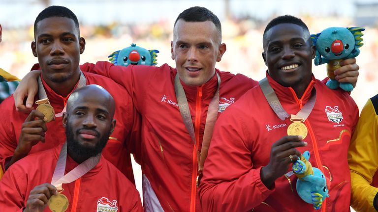 Team England (gold) Reuben Arthur, England's Zharnel Hughes, Richard Kilty and Harry Aikines-Aryeetey pose with their medals after the athletics men's 4x100m relay final during the 2018 Gold Coast Commonwealth Games at the Carrara Stadium