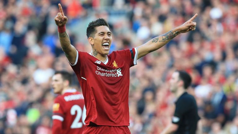 Roberto Firmino celebrates after making it 3-0 in the Premier League match against Bournemouth