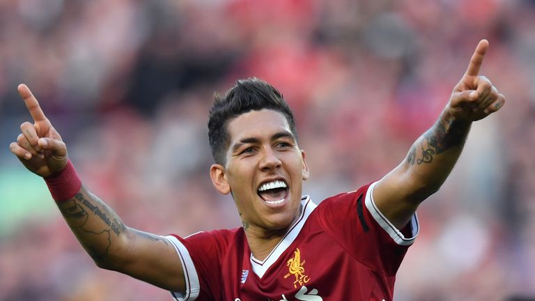 Liverpool's Roberto Firmino celebrates scoring his side's third goal of the game during the Premier League match against Bournemouth at Anfield
