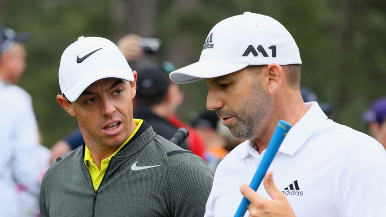 AUGUSTA, GA - APRIL 05:  (L-R) Rory McIlroy of Northern Ireland and Sergio Garcia of Spain walk off the 15th tee during a practice round prior to the start