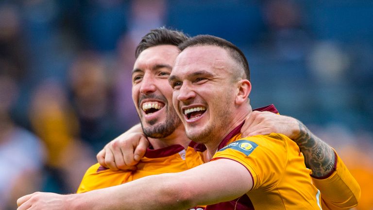 Motherwell's Ryan Bowman (L) celebrates with Tom Aldred at full-time after beating Aberdeen in the Scottish Cup semi-final