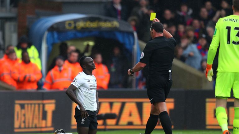 Sadio Mane is booked during Liverpool's win at Crystal Palace