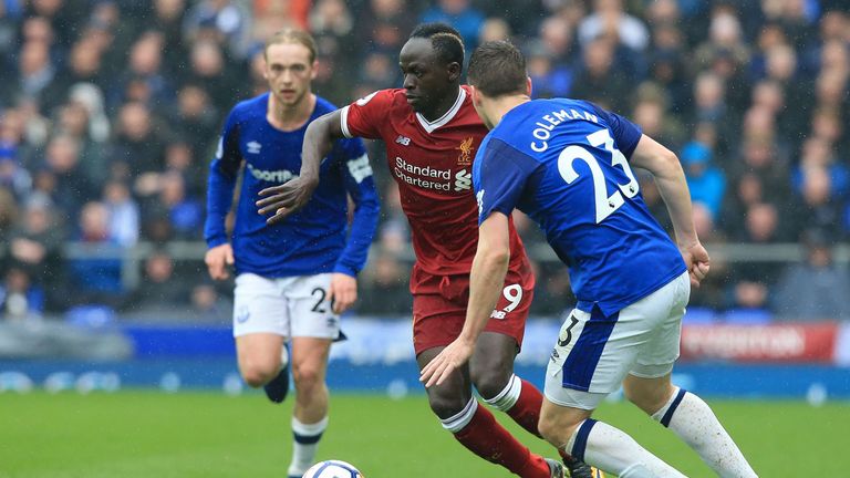 Sadio Mane takes on Seamus Coleman during the Premier League match between Everton and Liverpool at Goodison Park