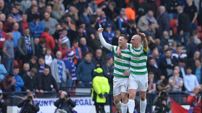 Callum McGregor of Celtic celebrates with team mate Scott Brown after scoring his sides second goal during the Scottish Cup Semi Final match between Rangers and Celtic
