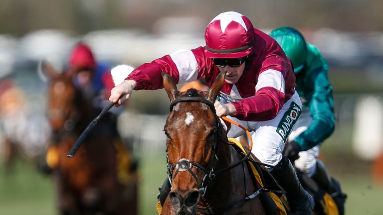 Sean Flanagan riding Identity Thief clear the last to win The Ryanair Stayers Hurdle Race at Aintree