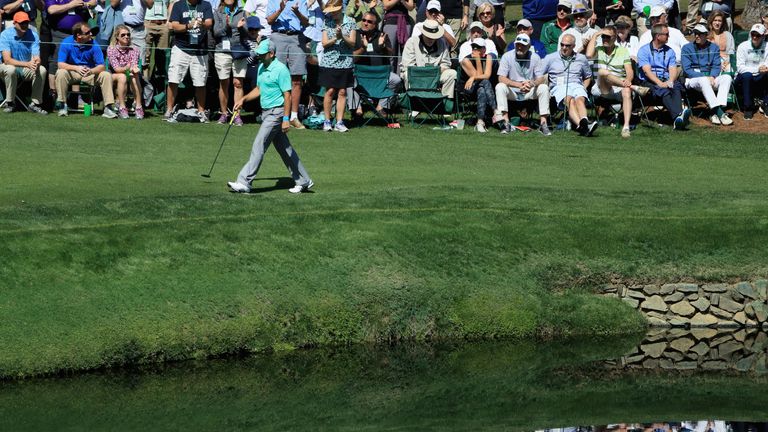 Sergio Garcia walks onto the 15th green during the first round of the 2018 Masters Tournament at Augusta National Golf Club 