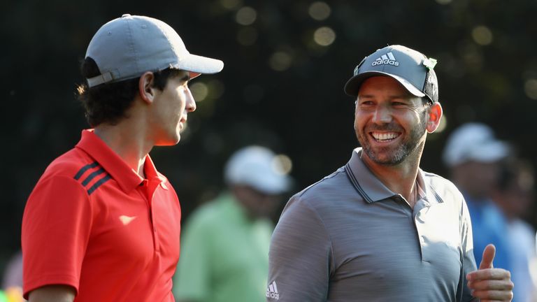 AUGUSTA, GA - APRIL 03: Amateur Joaquin Niemann of Chile and Sergio Garcia of Spain talk during a practice round prior to the start of the 2018 Masters Tournament at Augusta National Golf Club on April 3, 2018 in Augusta, Georgia.