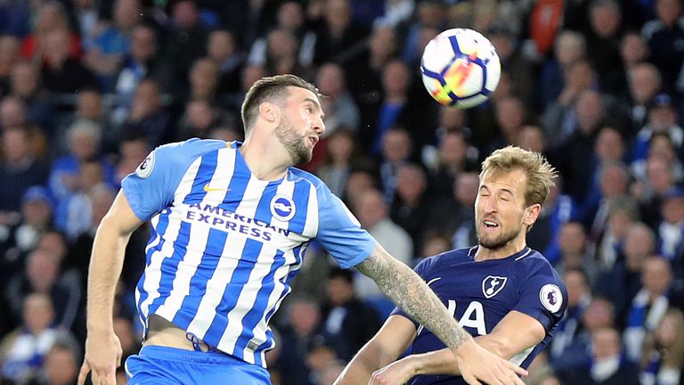 Brighton & Hove Albion's Shane Duffy (left) and Tottenham Hotspur's Harry Kane battle for the ball during the Premier League match at the AMEX Stadium, Brighton