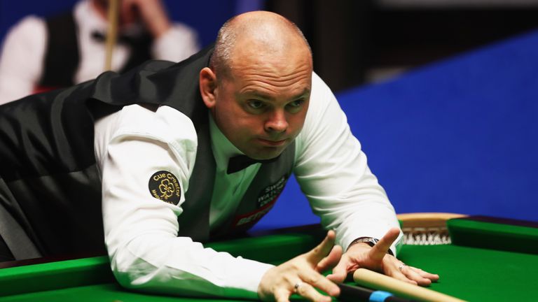 Stuart Bingham of England reacts after missing a shot during his first round match against Jack Lisowski of England during day four of the World Snooker Championship at Crucible Theatre on April 23, 2018 in Sheffield, England. 