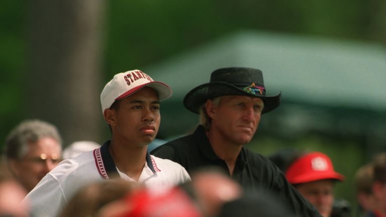 Tiger Woods alongside Greg Norman ahead of his Masters debut in 1995