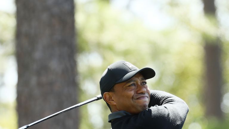 Tiger Woods plays his tee shot on the fourth hole during round one of the 2018 Masters Tournament at Augusta