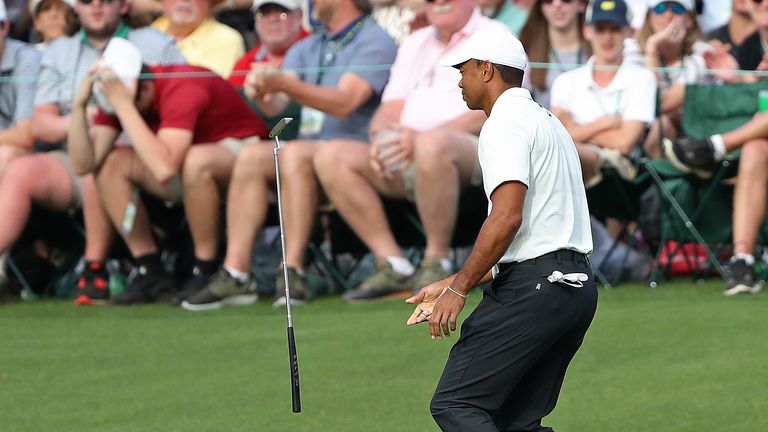 AUGUSTA, GA - APRIL 06: Tiger Woods of the United States flips his putter after missing a channce for birdie on the 14th hole during the second round of the 2018 Masters Tournament at Augusta National Golf Club on April 6, 2018 in Augusta, Georgia