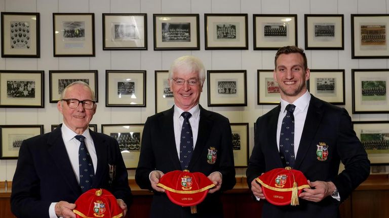 Tom Grace (centre) has presented caps to Ronnie Dawson (left) and Sam Warburton