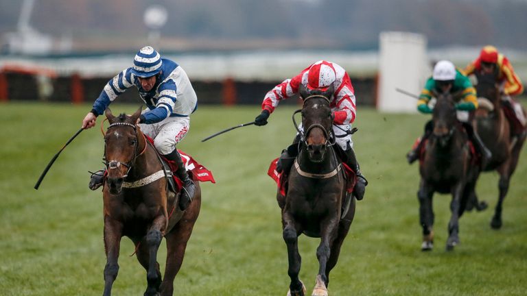 NEWBURY, ENGLAND - DECEMBER 02:  Paul Townend riding Total Recall (C, red) clear the last to win The Ladbrokes Trophy Steeple Chase from Whisper (L) at Newbury racecourse on December 2, 2017 in Newbury, United Kingdom. (Photo by Alan Crowhurst/Getty Images) *** Local Caption *** Paul Townend;Total Recall