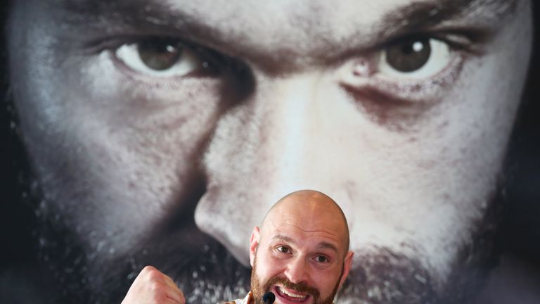 Tyson Fury addresses the media during a press conference at the Lowry Hotel in Manchester on April 26, 2018