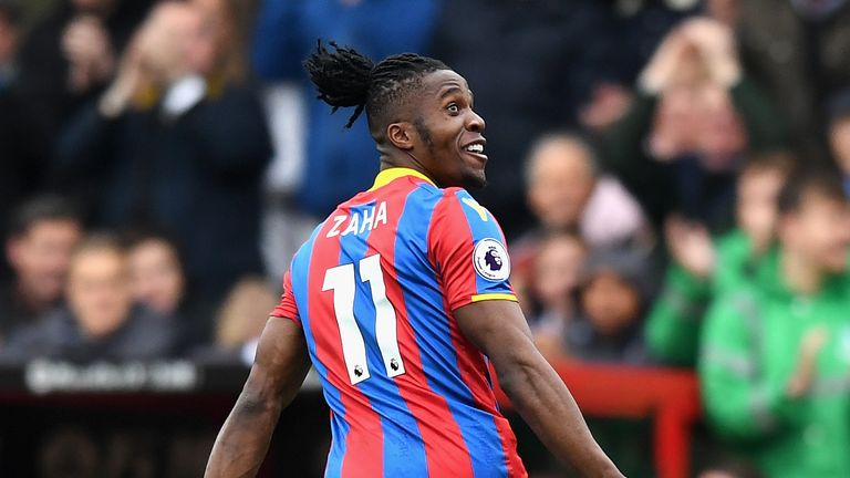 Wilfried Zaha celebrates after he scoring Crystal Palace's opening goal against Leicester City at Selhurst Park