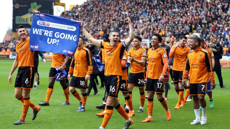 Wolverhampton Wanderers' Conor Coady (centre) and teammates celebrate winning promotion to the Premier League at at Molineux