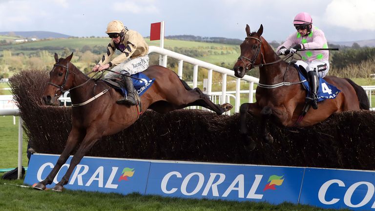 Bellshill ridden by David Mullins (left) jumps the last ahead of Djakadam ridden by Patrick Mullins to win the Coral Punchestown Gold Cup during day two of the Punchestown Festival 2018 at Punchestown Racecourse, County Kildare. PRESS ASSOCIATION Photo. Picture date: Wednesday April 25, 2018. See PA story RACING Punchestown. Photo credit should read: Niall Carson/PA Wire