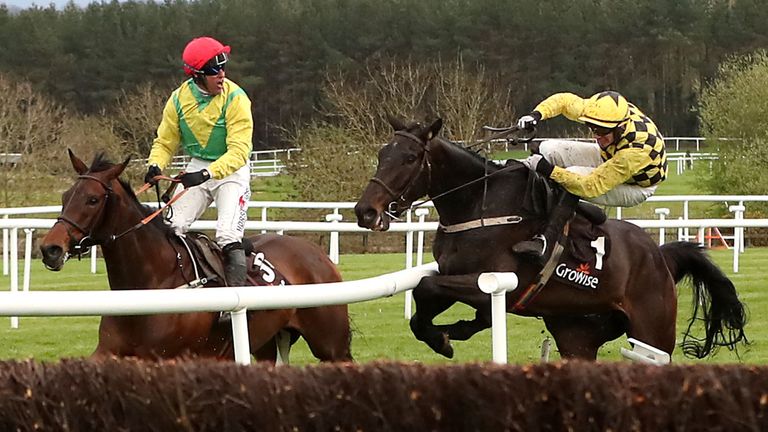 Al Bourm Photo ridden by Jockey Paul Townend (right) collides with Finian's Oscar ridden by Jockey Robbie Power (left) during day one of the Punchestown Festival 2018 at Punchestown Racecourse, County Kildare. PRESS ASSOCIATION Photo. Picture date: Tuesday April 24, 2018. See PA story RACING Punchestown. Photo credit should read: Niall Carson/PA Wire
