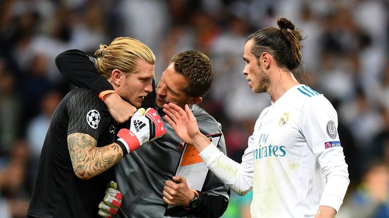 Players and staff from both sides sought to console Karius at the final whistle