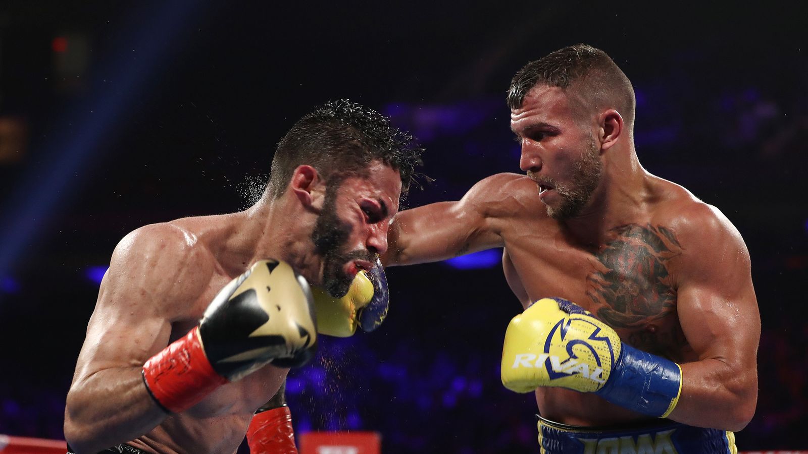 Vasyl Lomachenko celebrates after the final bell against Gary Russell...  News Photo - Getty Images