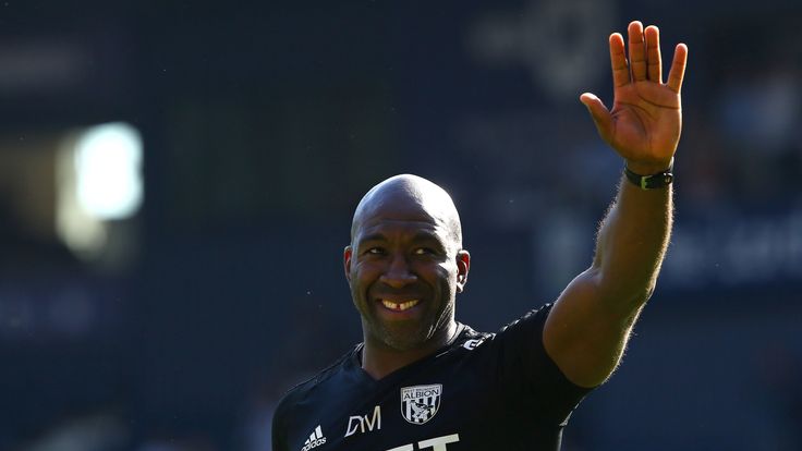 Darren Moore salutes the West Brom fans after their 1-0 win over Spurs