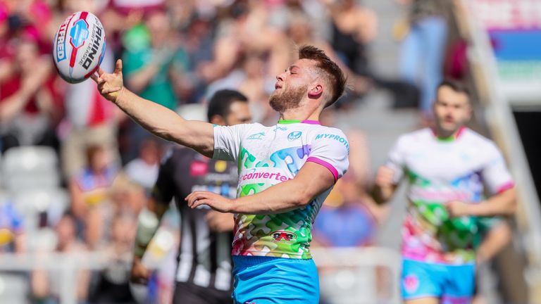 Danny Richardson of St Helens celebrates his try.