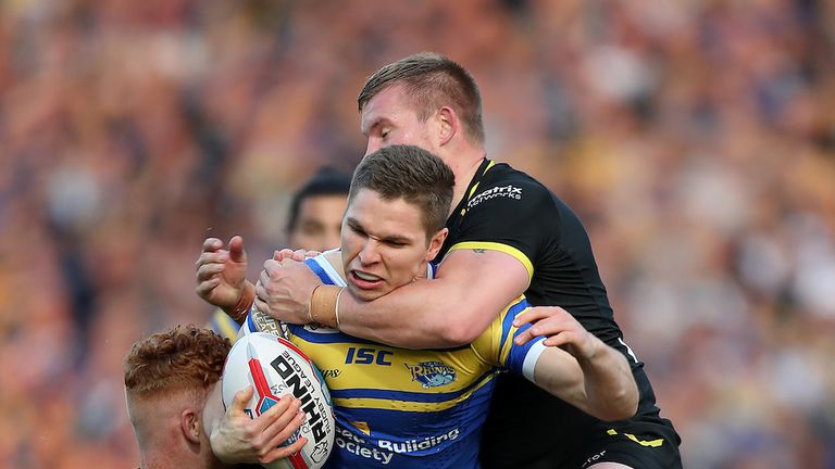 Picture by John Clifton/SWpix.com - 04/05/2018 - Rugby League - Betfred Super League - Leeds Rhinos v Warrington Wolves - Headingley Carnegie Stadium, Leeds, England -.Leeds Rhinos... Matt Parcell in action with Warrington Wolves... Harvey Livett and Mike Cooper