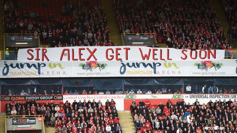 Aberdeen fans display a banner in support of former manager Sir Alex Ferguson