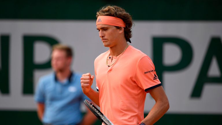 Germany's Alexander Zverev celebrates after victory against Lithuania's Ricardas Berankis during their men's singles first round match on day one of The Roland Garros 2018 French Open tennis tournament in Paris on May 27, 2018. 