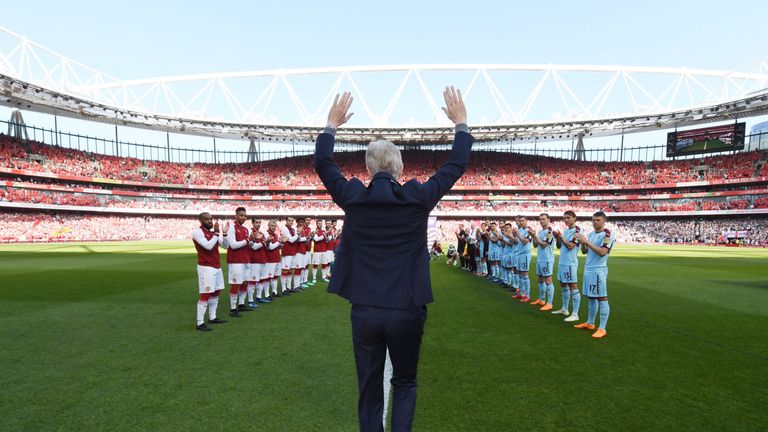 Arsene Wenger walks out to a guard of honour in his last game as manager of Arsenal at the Emirates Stadium