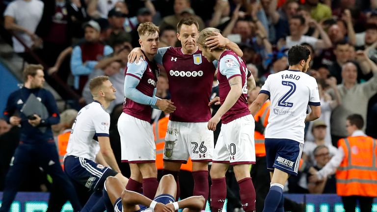 Aston Villa players celebrate after beating Middlesbrough