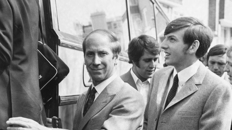  Bobby Charlton (left) with Martin Peters (right) and Geoff Hurst (centre) boarding a bus taking the England squad to London Airport where they fly out to Mexico to defend their World Cup title
