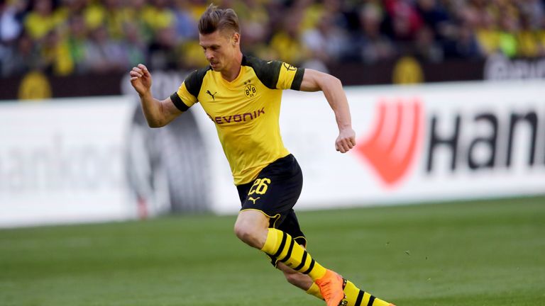 Lukasz Piszczek sports the new strip against Mainz 05 in the club's final home game of 17/18