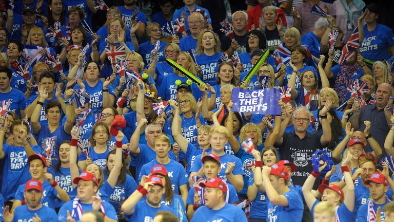 British fans cheer on Britain's Dan Evans against Argentina's Leonardo Mayer during the Davis Cup World Group semi-final singles match 5 between Britain and Argentina at the Emirates Arena in Glasgow, Scotland, on September 18, 2016. A tearful Leonardo Mayer fired Argentina into the Davis Cup final on Sunday after his victory over Dan Evans handed his side a 3-2 victory over holders Great Britain. / AFP / Andy Buchanan 