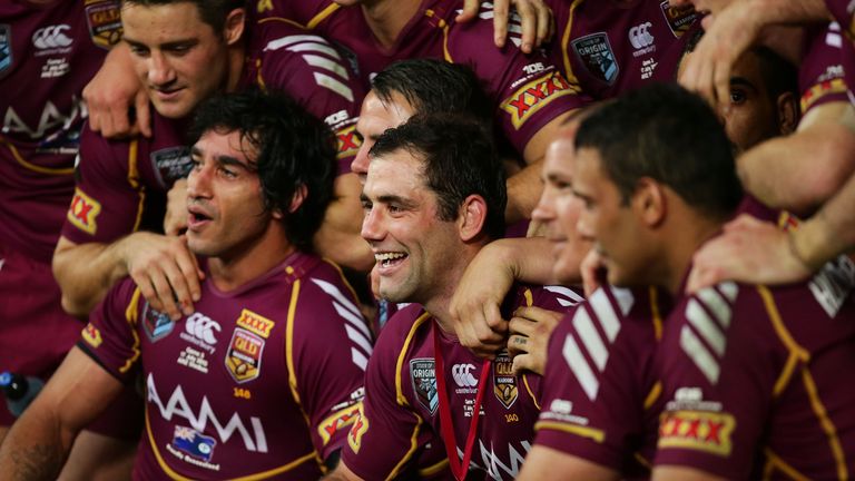 Cameron Smith celebrates with team mates after victory during game three of the ARL State of Origin series 2013 