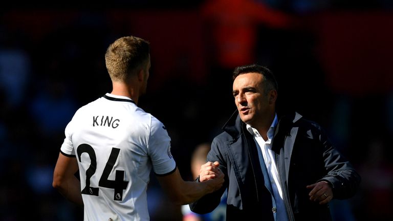Carlos Carvalhal shakes hands with Andy King following Swansea's relegation from the Premier League