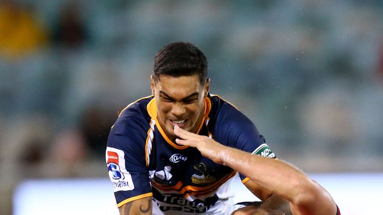 Peni tackles Crusaders rival Israel Dagg during the Brumbies' 21-8 defeat in Canberra