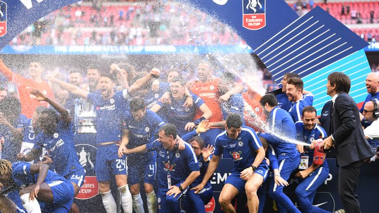 Chelsea manager Antonio Conte sprays his side with champagne after their FA Cup final victory over Manchester United