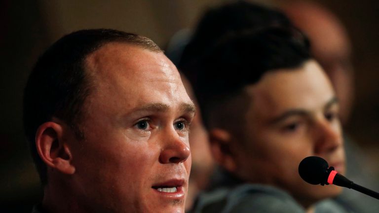 Chris Froome (L) of Team Sky gives a press conference in Jerusalem