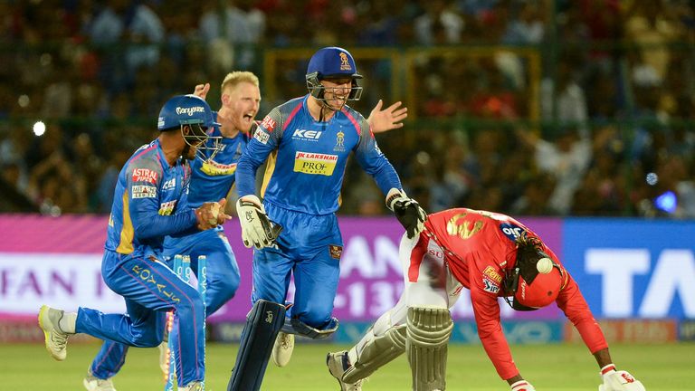 Jos Buttler and Ben Stokes of Rajasthan Royals celebrate the wicket of Kings XI Punjab's Chris Gayle (Credit: AFP)