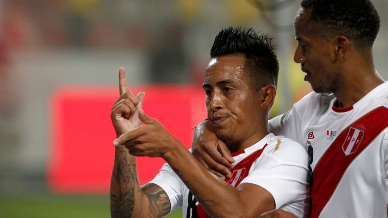 Christian Cueva celebrates after scoring for Peru against Scotland