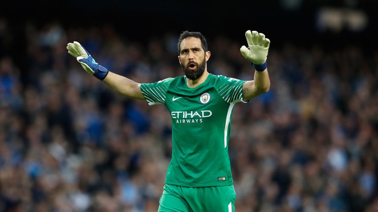 Manchester City goalkeeper Claudio Bravo celebrates his side's first goal of the game during the Premier League match at the Etihad Stadium, Manchester. PRESS ASSOCIATION Photo. Picture date: Wednesday May 9, 2018. See PA story SOCCER Man City. Photo credit should read: Martin Rickett/PA Wire. RESTRICTIONS: EDITORIAL USE ONLY No use with unauthorised audio, video, data, fixture lists, club/league logos or "live" services. Online in-match use limited to 75 images, no video emulation. No use in betting, games or single club/league/player publications