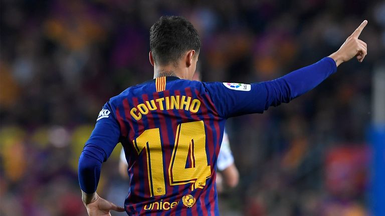 Barcelona's Brazilian midfielder Philippe Coutinho celebrates after scoring a goal during the Spanish league football match between FC Barcelona and Real Sociedad at the Camp Nou stadium in Barcelona on May 20, 2018. (Photo by LLUIS GENE / AFP)        (Photo credit should read LLUIS GENE/AFP/Getty Images)