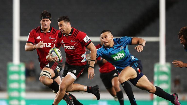  David Havili of the Crusaders makes a break past Sonny Bill Williams