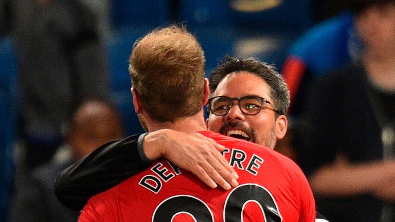 David Wagner celebrates Huddersfield Town's Premier League survival with goalscorer Laurent Depoitre
