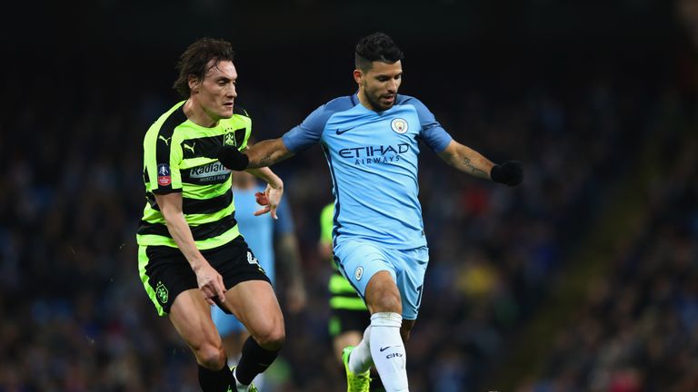 Dean Whitehead (left) and Sergio Aguero in action during Huddersfield's FA Cup replay with Manchester City in 2017.
