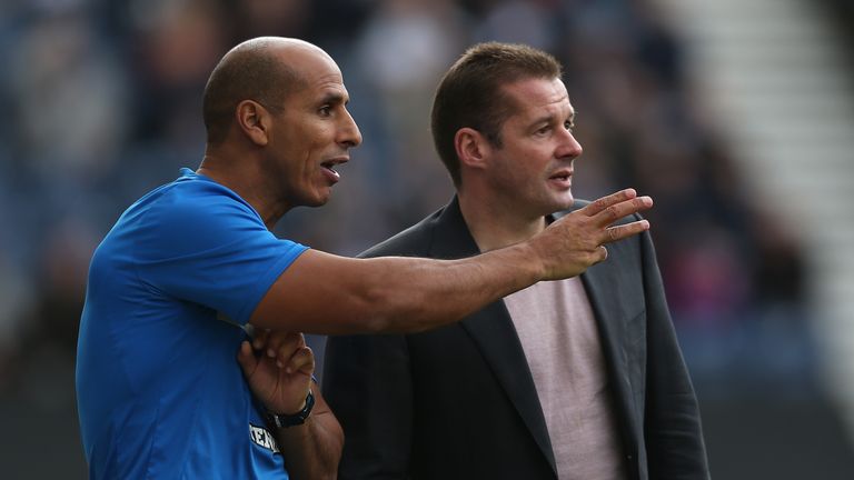 Dino Maamria (L) and Graham Westley of Preston North End in action with of MK Dons during the npower League One match between Preston North End and MK Dons at Deepdale on October 14, 2012 in Preston, Lancashire.