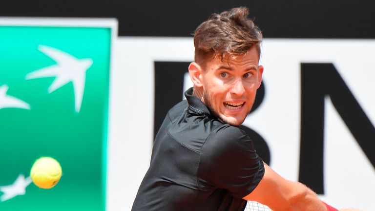 Austria's Dominic Thiem hits a return to Italy's Fabio Fognini during Rome's ATP Tennis Open tournament at the Foro Italico, on May 16, 2018 in Rome